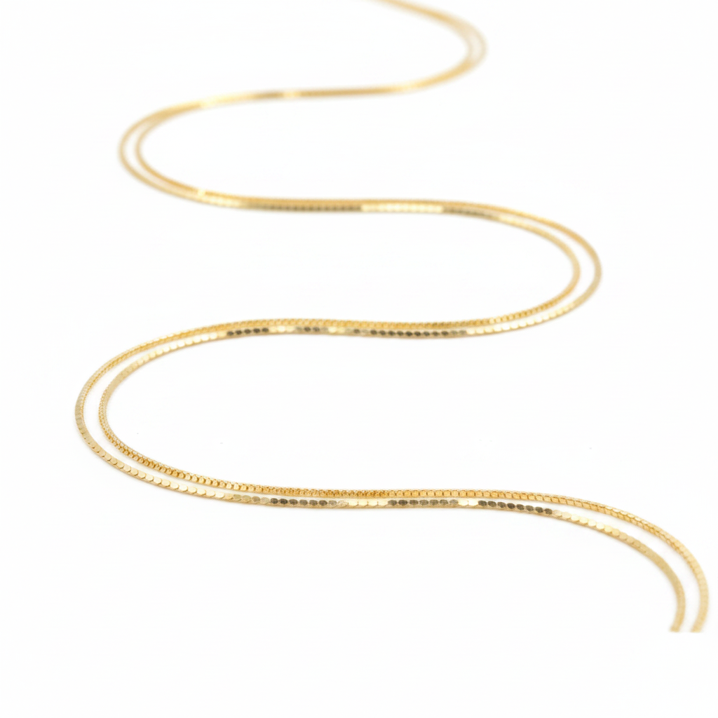 Detalle eslabones lisos cadena oro 18k