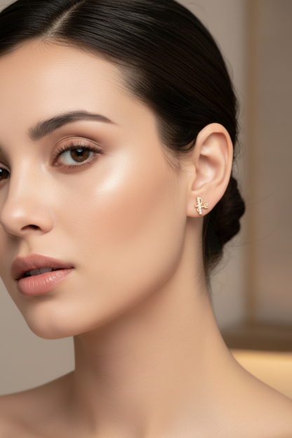 Topos Fe oro 18k en rostro femenino