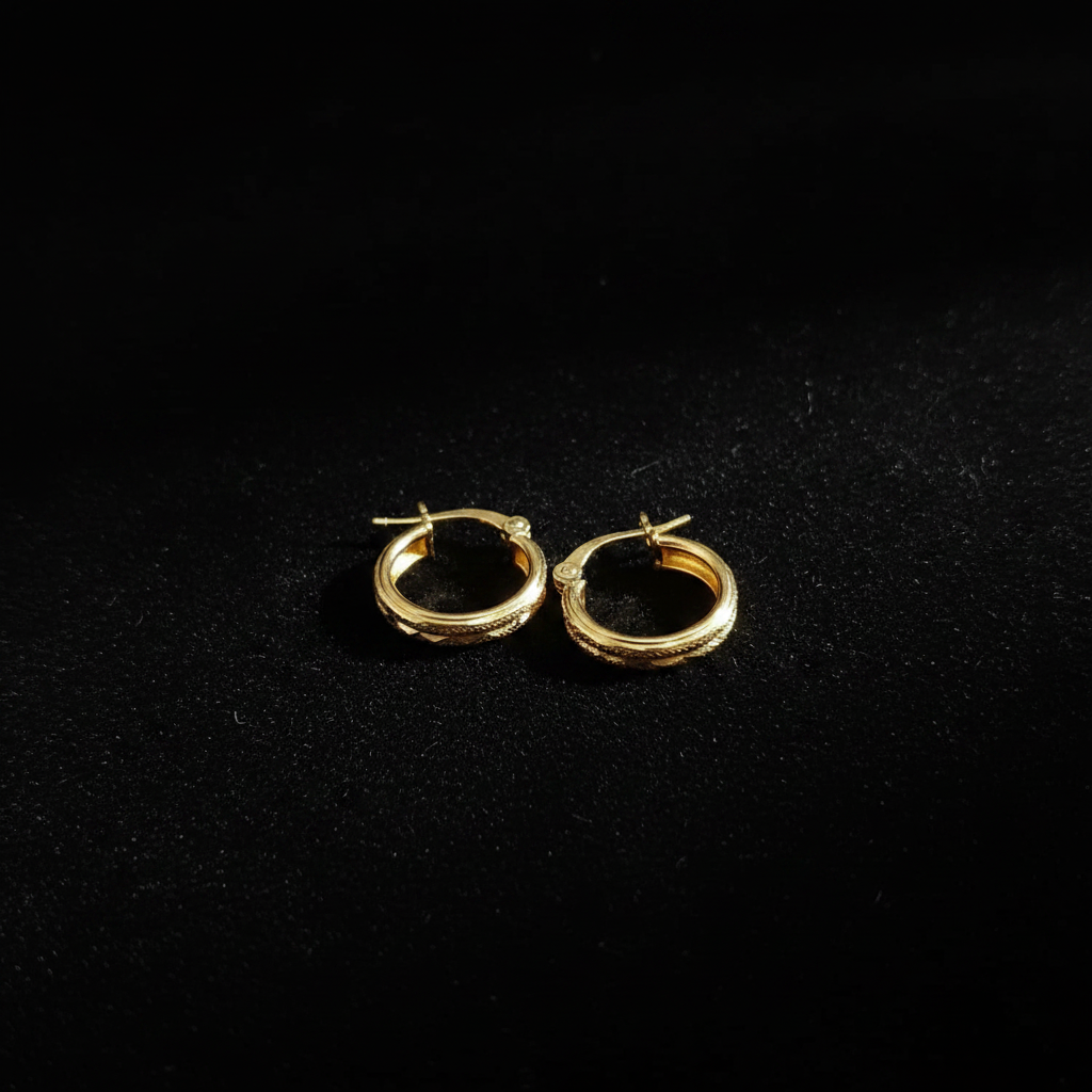 Candonga Oro Diamantada 18K fondo negro editorial