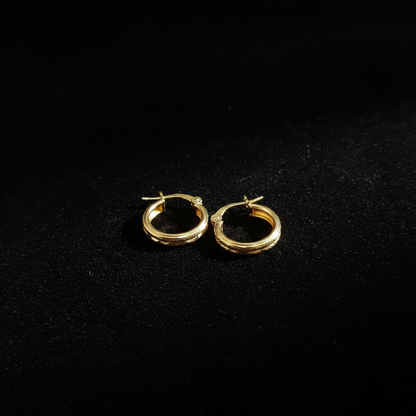 Candonga Oro Diamantada 18K fondo negro editorial