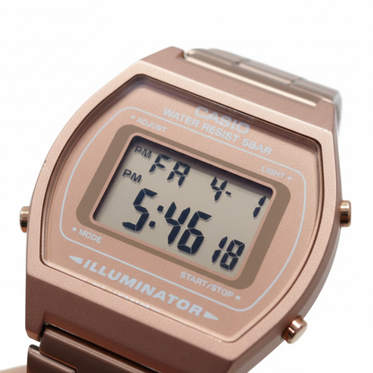 Reloj Casio digital oro rosa — macro pantalla LCD