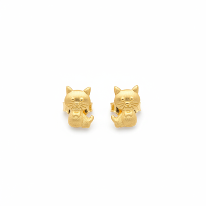Topos gato oro 18K flat lay fondo blanco